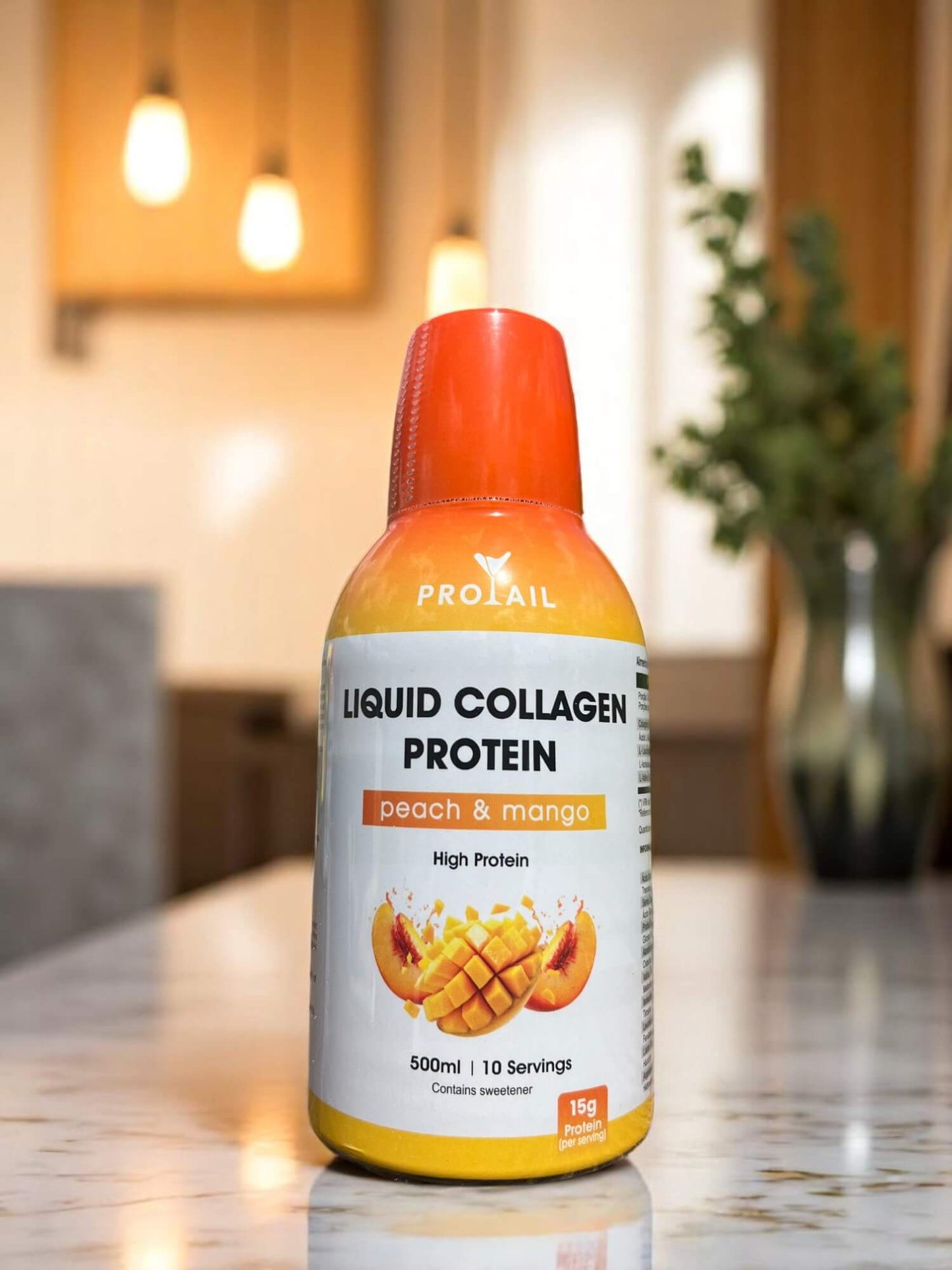Bottle of Protail Liquid Collagen Protein on a kitchen counter with a blurred background